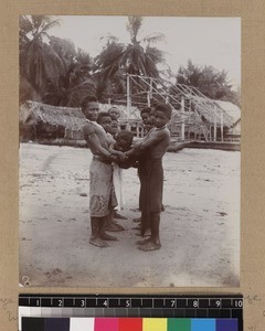Boys playing game on beach, Delena, Papua New Guinea, ca. 1905-1915