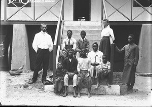 Group of people in front of the mission house in Antioka, Mozambique, ca. 1896-1911