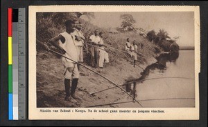 Schoolboys fishing on a riverbank, Congo, ca.1920-1940