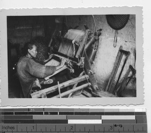 A Chinese woman weaving at Luojing, China, 1935