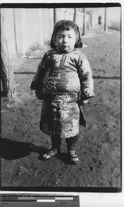 A girl in winter clothes at Fushun, China, 1937