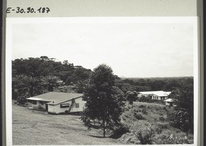 Manyemen. A view of the nurses' house and of the hospital