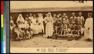 Missionary sisters treating people outdoors, Congo, ca.1920-1940