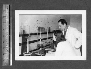 Observing a chemistry experiment, Chengdu, Sichuan, China, ca.1944