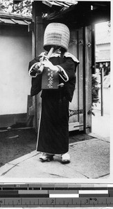 Portrait of a komuso playing a shakuhachi, Japan, ca. 1940