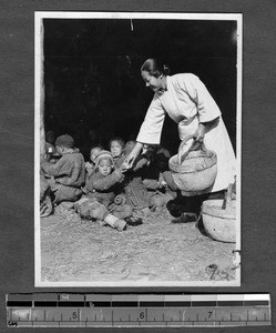 Feeding refugee children, Jinan, Shandong, China, ca.1928