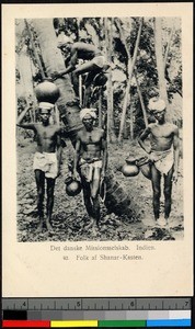 Medical missionary preaching to people in a forest, India, ca.1920-1940