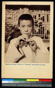 Flute player, China, ca.1920-1940