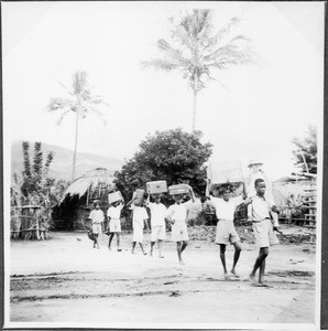 Boys carrying burdens, Tanzania, ca.1934-1938