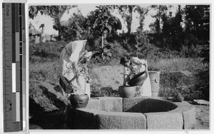 Korean women gathering water from a well, Korea, ca. 1920-1940