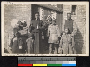 Teachers standing outdoors with wives and children, Jiangsu, China, ca.1905-1910