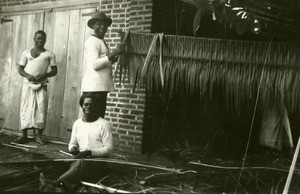 Catechists making a cover for a roof, in Gabon