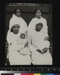 Mothers and babies with staff from the maternity ward, Imerimandroso Hospital, Madagascar, 1937