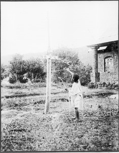 Boys shooting with bows and arrows, Tanzania, 1927-1938