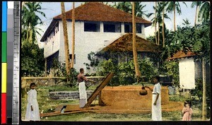 Women and children operating well, Calicut, India, ca.1920-1940