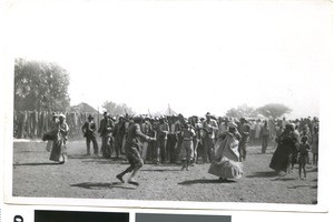 Men singing war song at the coronation celebration, Ramotswa, Botswana, 1937