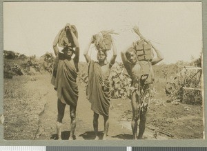 Carrying bricks, Chogoria, Kenya, ca.1924