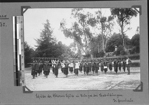 Missionary Gemuseus with students, Rungwe, Tanzania, ca. 1898-1914