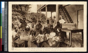 Indigenous novices weaving baskets, Libreville, Gabon, ca. 1900-1930