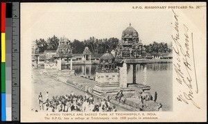 People standing by a large pool used for Hindu religious services, Trichinopoly, India, ca.1920-1940