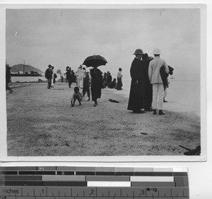 Maryknoll priests speak wtih the Chinese at Hong Kong, China, 1924