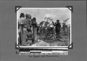 The missionaries Giersch and Hildegard Marie Tietzen play music near Mbozi, Tanzania, ca.1927-1929