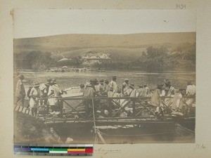 A ferry transporting people from one side of the river to the other, Antanjana, Madagascar, 1901