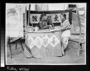 Public writer at stand along street, China, ca.1920-1930