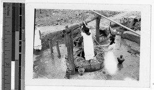 Drawing water in Maya village, Quintana Roo, Mexico, ca. 1947