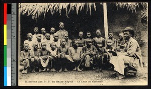 Catechist teaching a group of students, Senegal, ca.1920-1940