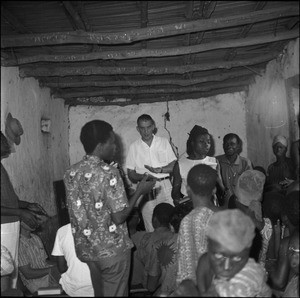 Rev. Jacques Maury managing a meeting