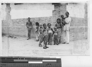 Woman with children in Beijing, China, 1936