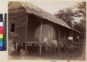 View of group outside teacher's house, Kabadi district, Papua New Guinea, ca. 1890