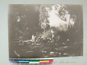 Travelling companions resting by the river, Iabohazo, Madagascar, 1905