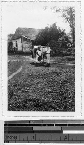 Couple leaving for a journey, Carrillo Puerto, Quintana Roo, Mexico, ca. 1944