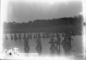 African people fishing with baskets, Makulane, Mozambique, ca. 1896-1911