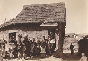 Colporteur calling at house to sell Bibles, China. ca. 1910-1920