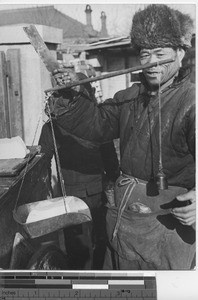 A peddler at Fushun, China, 1939