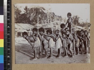 Children playing game, Delena, Papua New Guinea, ca. 1905-1915