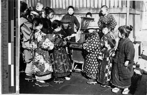 Man selling rice cakes, Japan, August 1932