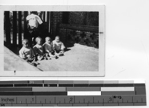 Four baby orphans at Luoding, China, 1937