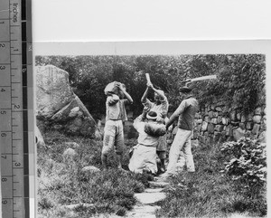 School boys acting out the Good Samaritan parable, Leshan, Sichuan, China, ca.1915-1925