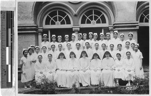 Group portrait of Maryknoll Sisters and St. Paul's Hospital nursing school students, Manila, Philippines, March 20, 1936