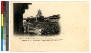 Missionary and man in Seringam Pagoda's sanctuary, India, ca.1920-1940