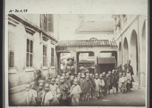 Schoolchildren in Hong Kong guided by a rope