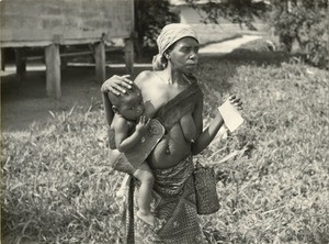 Mother with a child, in Gabon