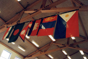 Annual Meeting of Danish Santal Mission in Hadsten, 1999. Flags from the Mission areas. From le