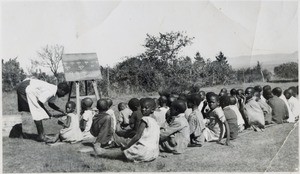 Writing lesson, outdoors