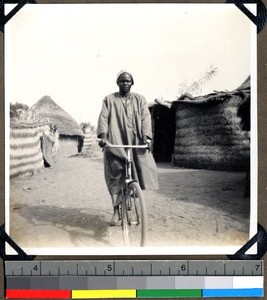 Village chief on a bicycle, Shendam, Nigeria, 1923