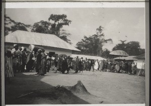 "The King of Mooso leaving after the mission anniversary festival (behind him his great drum)." (Photograph by Mrs Schäfer, 1929)